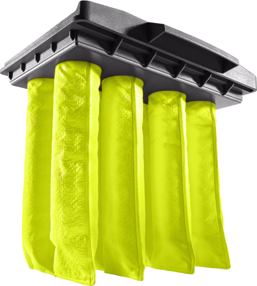Close-up, low-angle view of the underside of a dark grey molded support plate with parallel ribs and recessed compartments, from which several thick bright yellow cylindrical felt-like pads hang in vertical rows. High-contrast studio lighting highlights the matte, slightly textured surface of the support plate and the soft, fibrous texture of the yellow pads; pronounced shadows emphasize the ribbed structure and the folds and seams of the hanging cylinders. The composition fills the frame with repeating vertical elements and strong tonal contrast, creating an abstract, industrial aesthetic on an isolated white background.